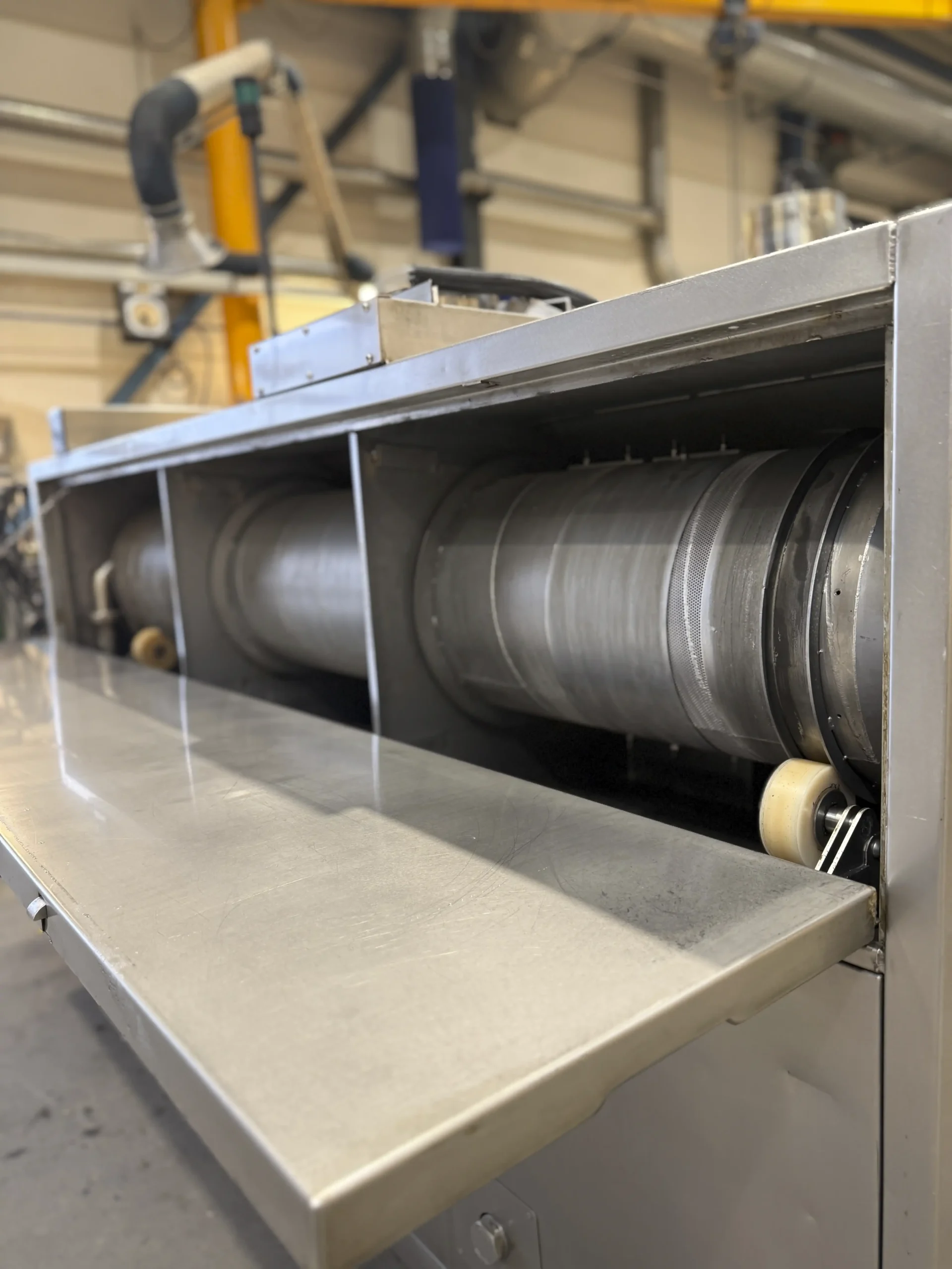 Drum inside a KSN Drum Washer Model 350 WRD for industrial parts cleaning.